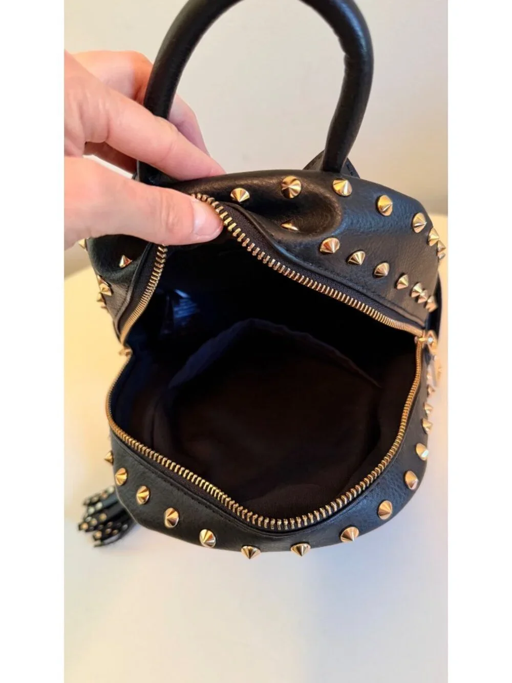 Bebe Black Mini Backpack Purse With Gold Studs & Tassel Accent